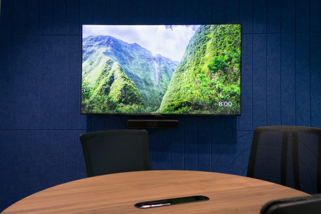 Acoustic panels integrated into office interior as a clean and cohesive wall surface