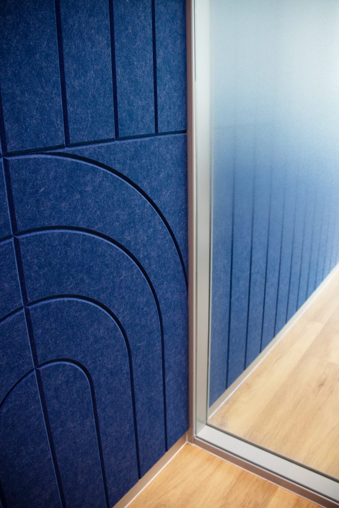 Acoustic panel wall in meeting room supporting clear conversations and video calls