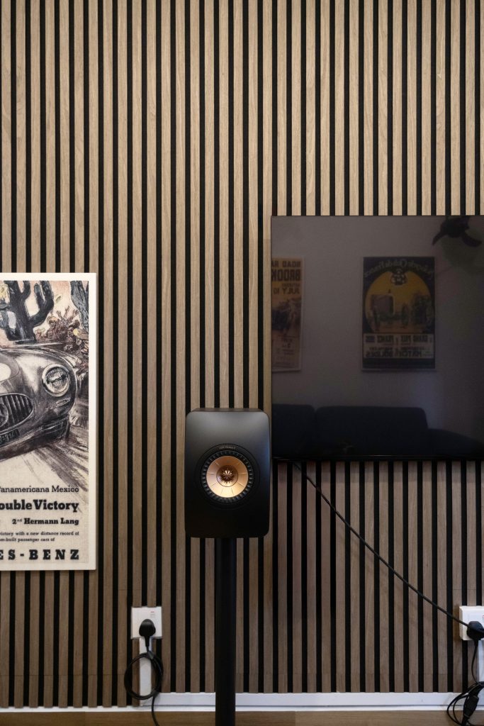 Slatwood Acoustic panels Singapore installation on feature wall for home theatre sound treatment