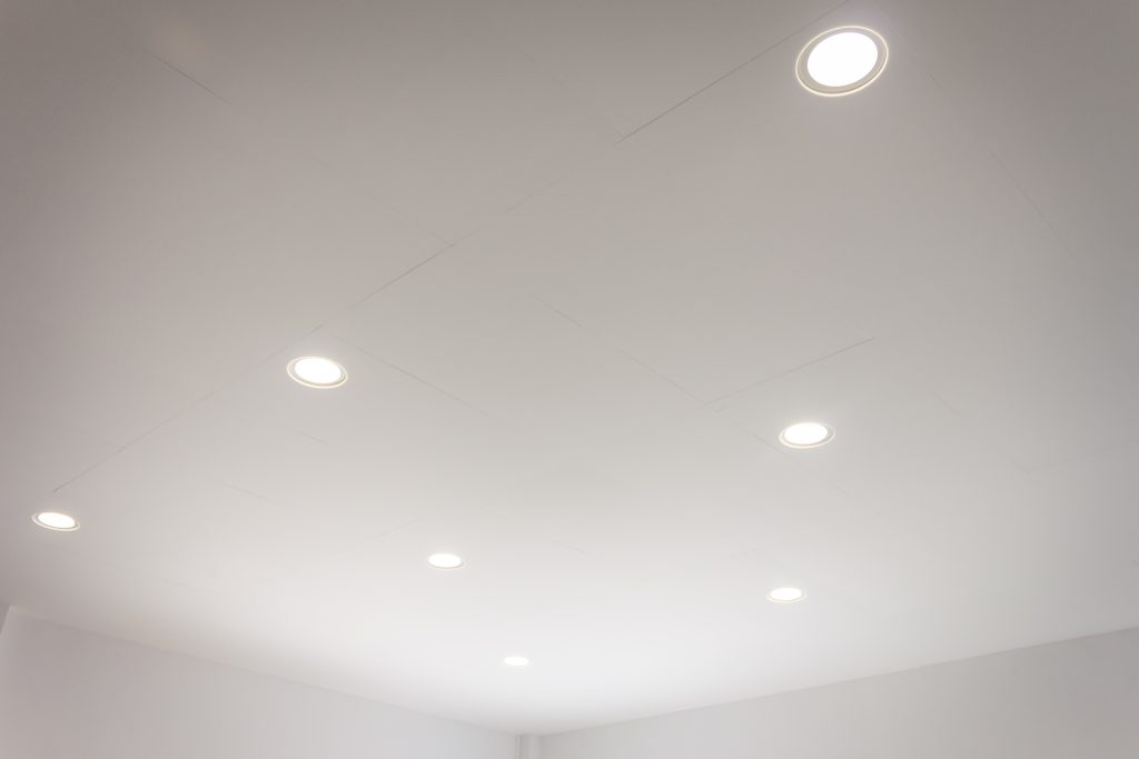 Acoustic panels ceiling layout adapted around lighting and fixtures in church space