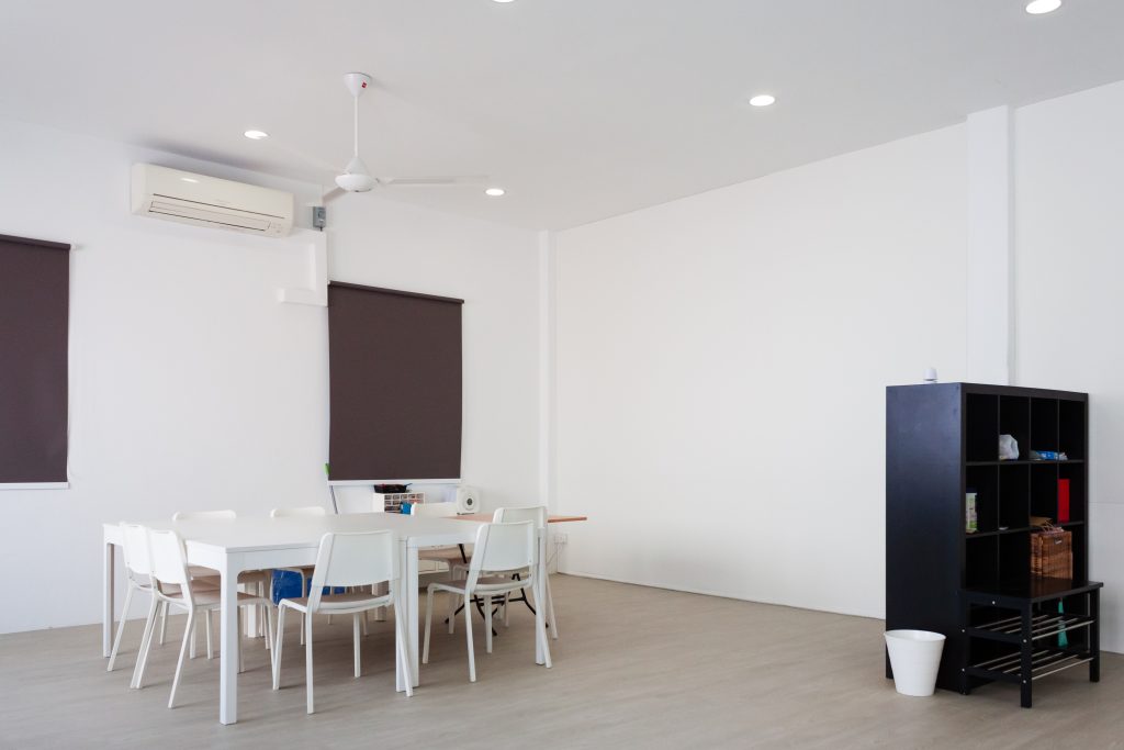 Sound reduction panels installed on ceiling and wall for improved clarity in church space