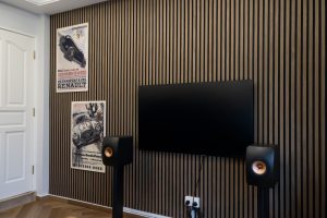 Klar™ Slatwood SD03 Walnut vertical slat acoustic panels managing sound reflections in home entertainment room Springleaf Singapore
