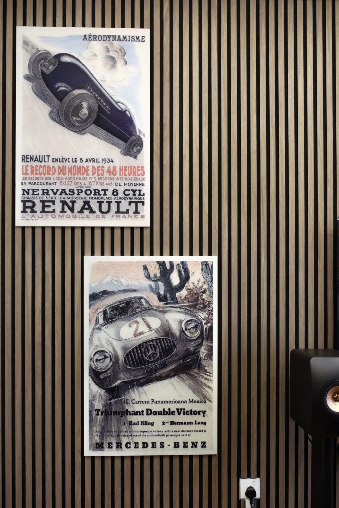 Walnut slat acoustic wall panels installed for sound absorption and visual warmth in interior space