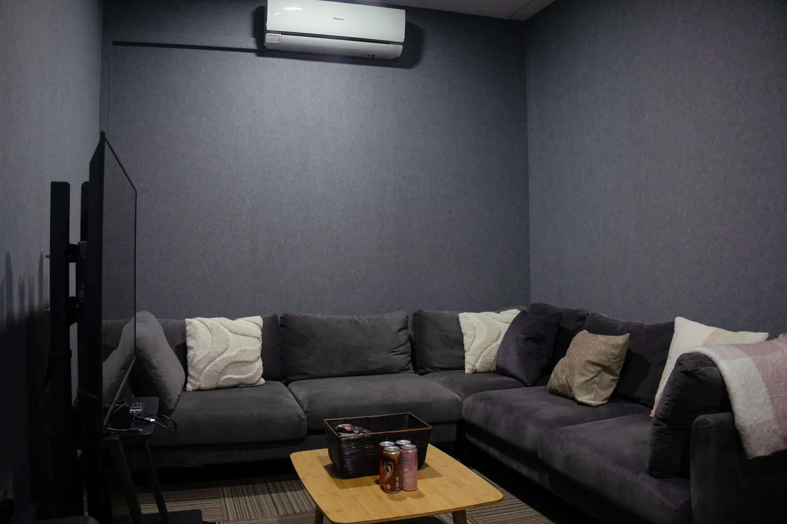 Klar™ Essentials CM19 Moonlight acoustic wall panels behind sofa at Weave creative production office Singapore