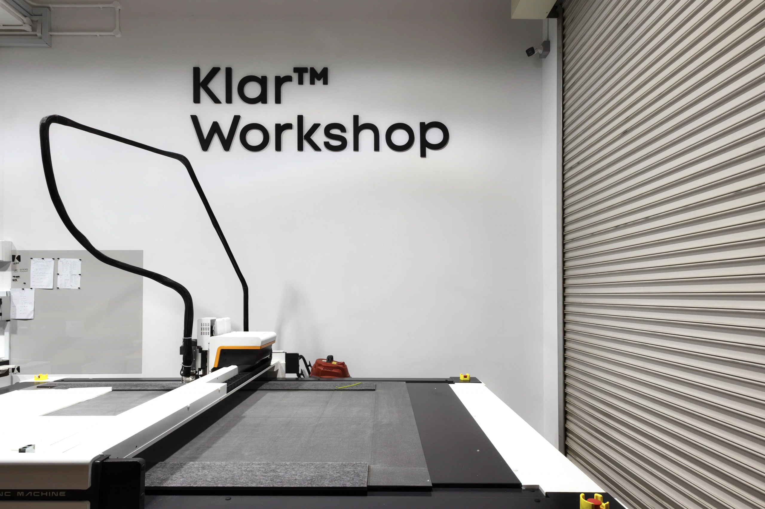 CNC cutting machine in the Klar™ Workshop, where acoustic panels are cut and printed in-house